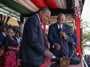 President Uhuru Kenyatta with CBK boss Patrick Njoroge during launch of new notes