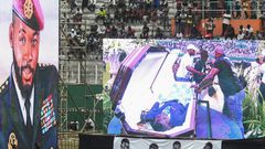 DJ Arafat's coffin was placed at the centre of the football pitch
