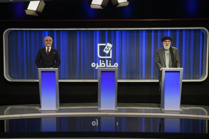 Afghan presidential candidates Abdullah Abdullah (left) and Gulbuddin Hekmatyar take part in a presidential debate at Tolo News TV station in Kabul. Current President Ashraf Ghani faced derision when he declined to particpate