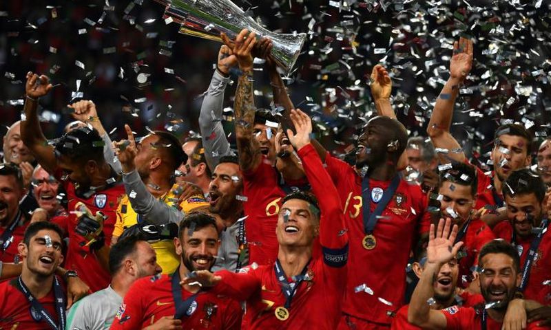 Portugal captain Cristiano Ronaldo lifts the Nations League trophy