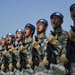 Chinese troops take part in marching drills ahead of an October 1 military parade to celebrate the 70th anniversary of the founding of the People's Republic of China
