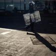 Police officers looks on as he patrols near Tredgold Magistrates courts on August 19, 2019, in Bulawayo, Zimbabwe