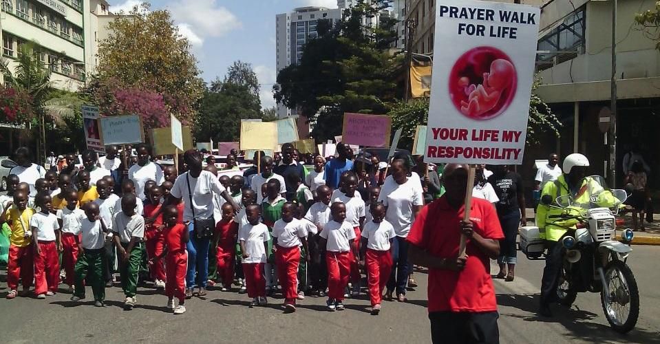 A past anti-abortion march sponsored by the catholic church. Catholic doctors oppose cervical cancer vaccine to be given to 10-year-old Kenyan girls starting July