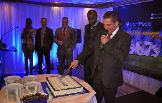 File image of Sportpesa CEO Ronald Karauri flanked by other guests at a past function