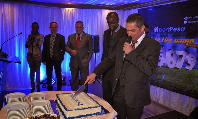 File image of Sportpesa CEO Ronald Karauri flanked by other guests at a past function