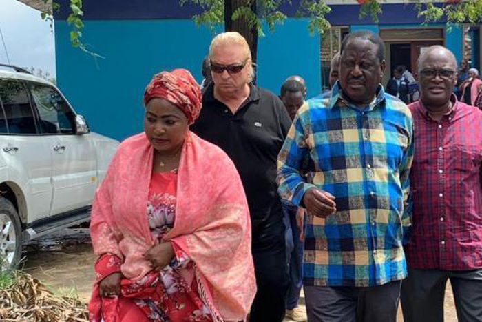 Raila Odinga and Mbishi Mboko at Likoni Ferry tragedy where he was briefed on the progress of the mission to retrieve the bodies of the victims