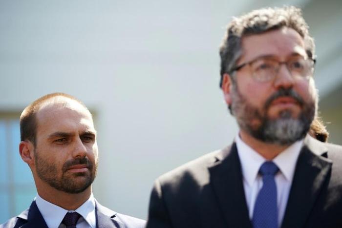 Brazil's Foreign Minister Ernesto Araujo, with President Jair Bolsonaro's son Eduardo, met US President Donald Trump at the White House to discuss fires in the Amazon