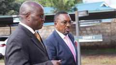 Lawyer Assa Nyakundi with his client Apostle James Ng'ang'a during his trial at the Limuru Law Courts