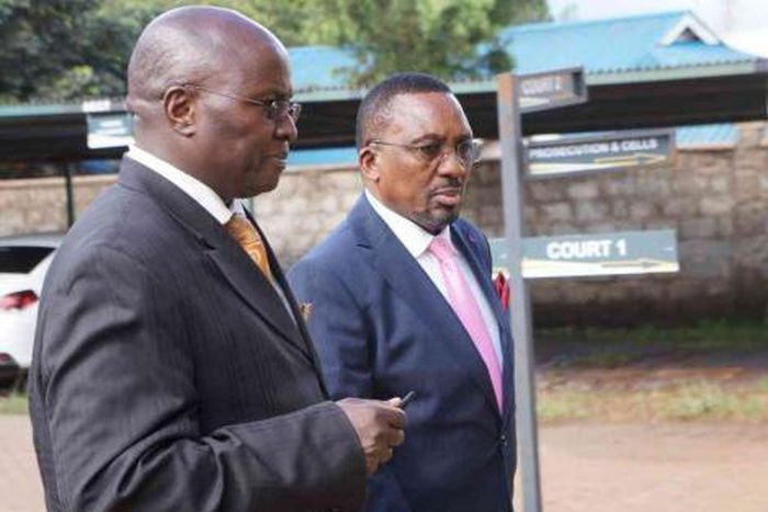 Lawyer Assa Nyakundi with his client Apostle James Ng'ang'a during his trial at the Limuru Law Courts