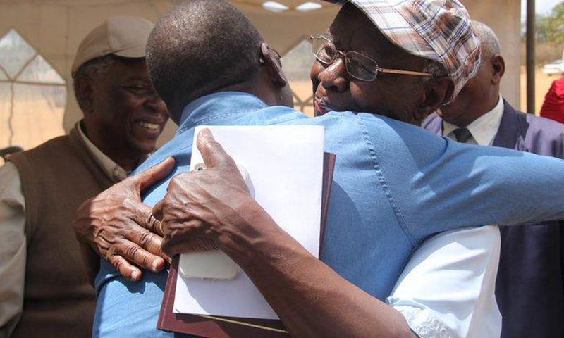 File image of Prof Mbiti hugging former CJ willy Mutunga