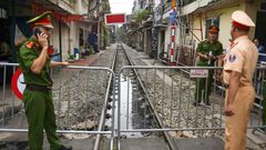 The narrow railway corridor in central Hanoi had become a hotspot among visitors seeking the perfect holiday snap on the atracks - often dodging trains that rumble through daily