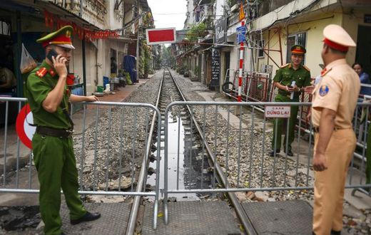The narrow railway corridor in central Hanoi had become a hotspot among visitors seeking the perfect holiday snap on the atracks - often dodging trains that rumble through daily