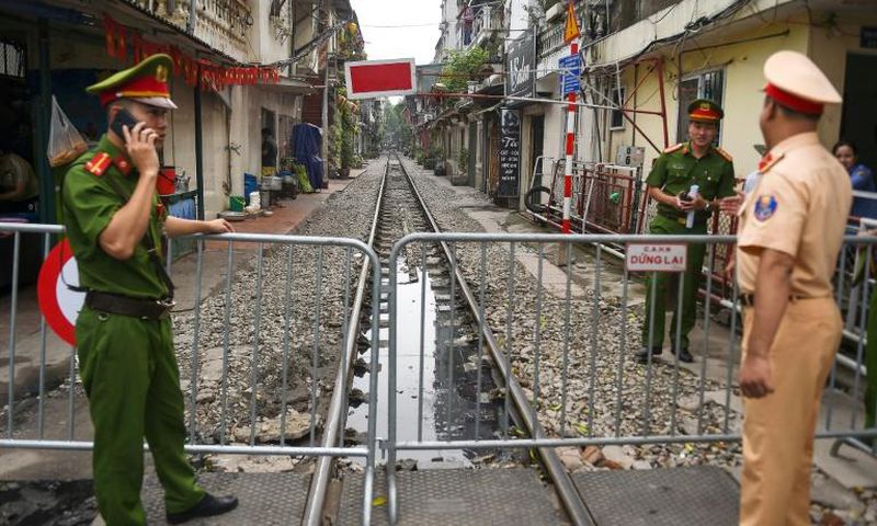 The narrow railway corridor in central Hanoi had become a hotspot among visitors seeking the perfect holiday snap on the atracks - often dodging trains that rumble through daily