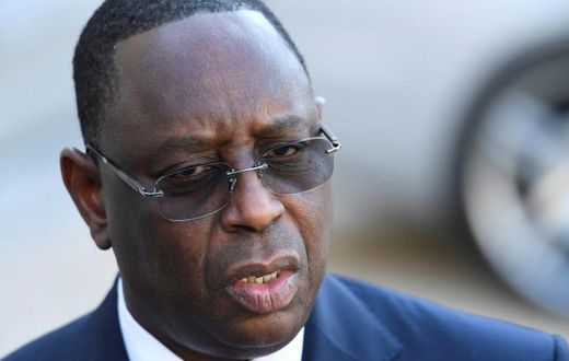 The former journalist had been charged for "offending" Senegal's President Macky Sall, pictured