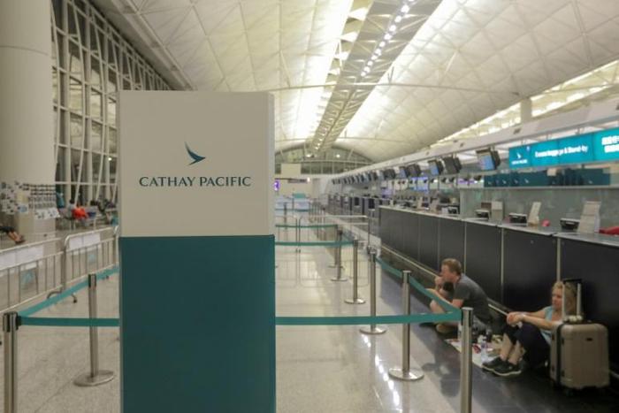Airport authorities cancelled flights and closed check-ins at Hong Kong airport on Monday and Tuesday as protesters swarmed the building, stranding thousands of passengers