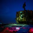 Turkish troops keep up their build-up along the Syrian border though the night as the government promises a long-threatend assault on the Kurdish-ruled northeast will begin "soon"