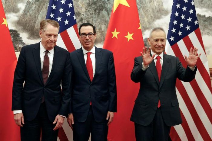 Chinese Vice Premier Liu He (R) gestures as US Treasury Secretary Steven Mnuchin (C) chats with US Trade Representative Robert Lighthizer in Beijing on May 1, 2019