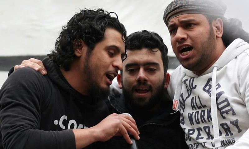 Abdel-Basset al-Sarout (L), a Syrian goalkeeper turned rebel fighter, was a popular singer of protest songs from the central city of Homs who starred in an award-winning documentary about his country's war