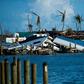 Destroyed boats are pushed up against the pier in the aftermath of Hurricane Dorian in Treasure Cay on Abaco Island, Bahamas