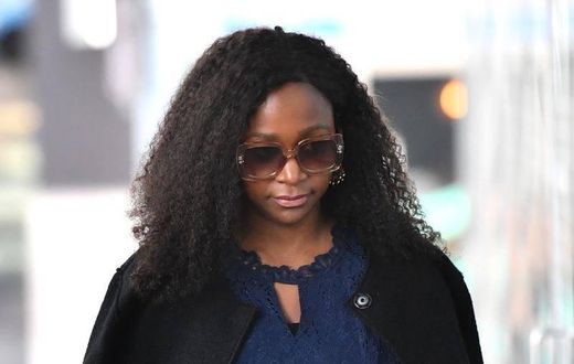 Esther Arunga leaving Court in Australia