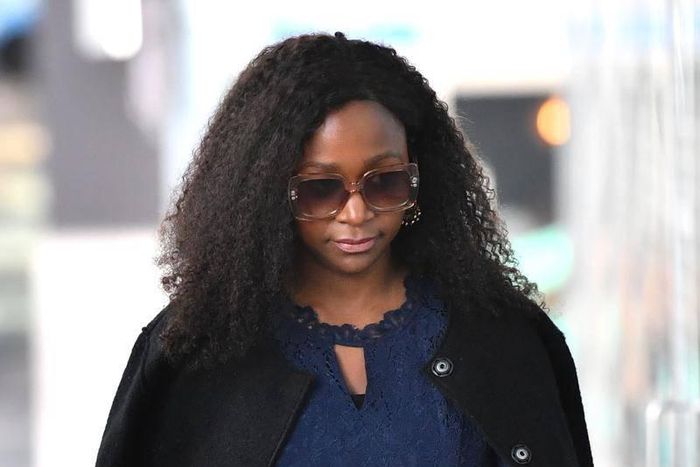 Esther Arunga leaving Court in Australia