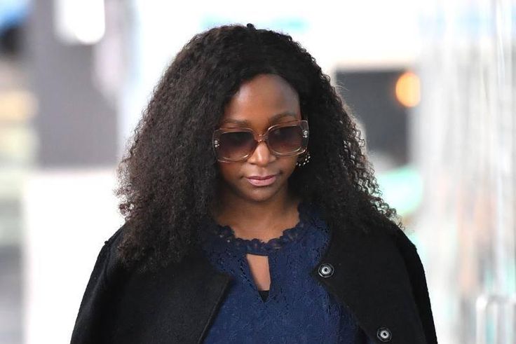 Esther Arunga leaving Court in Australia