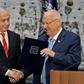 Israeli President Reuven Rivlin gives veteran incumbent Benjamin Netanyahu the potentially impossible task of forming a majority coalition while battling the looming threat of corruption charges