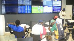 Gamblers in a betting shop in Kenya