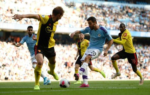 Manchester City's Bernardo Silva scores the sixth goal against Watford