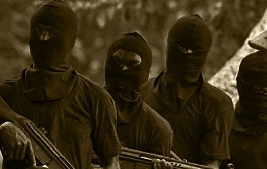 Unknown gunmen in face mask - Illustration purpose