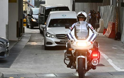 A hearse transporting Mugabe's body left a Singapore funeral parlour accompanied by a police escort
