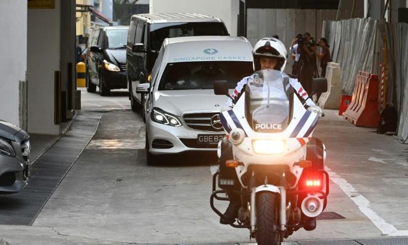 A hearse transporting Mugabe's body left a Singapore funeral parlour accompanied by a police escort
