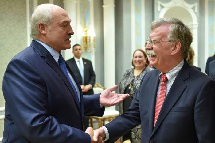 Belarus President Alexander Lukashenko (L) with US National Security Advisor John Bolton -- the highest-ranking US visit to Belarus in two decades