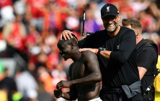 Liverpool manager Jurgen Klopp congratulates Sadio Mane after his two goals against Newcastle at Anfield