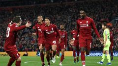 Liverpool's Divock Origi (R) celebrates after scoring against Barcelona