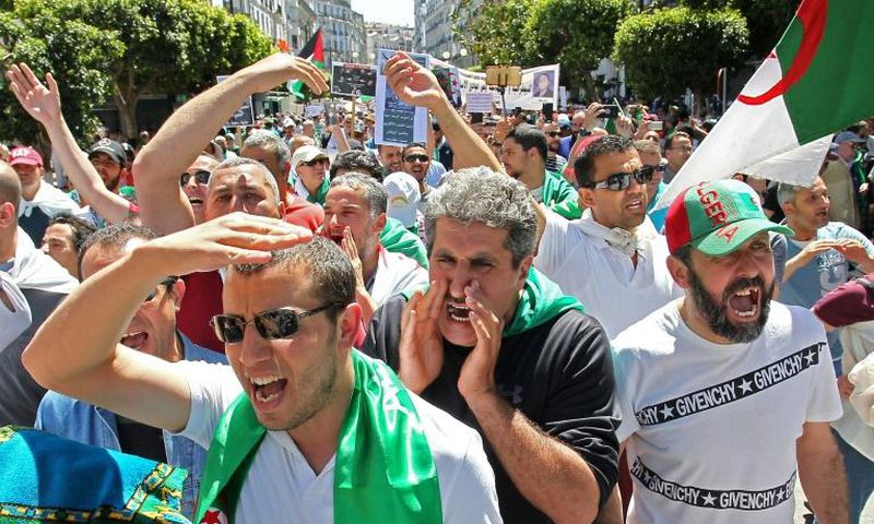 Algerian protesters brave blazing sunshine to press their demands for reform on the first Friday mass rally of Ramadan in Algiers