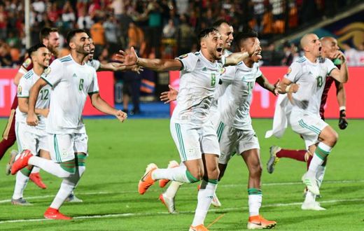 Algeria players celebrate their victory over Senegal in the Africa Cup of Nations final