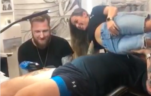 The Mountain Bench Presses Wife in Tattoo Studio