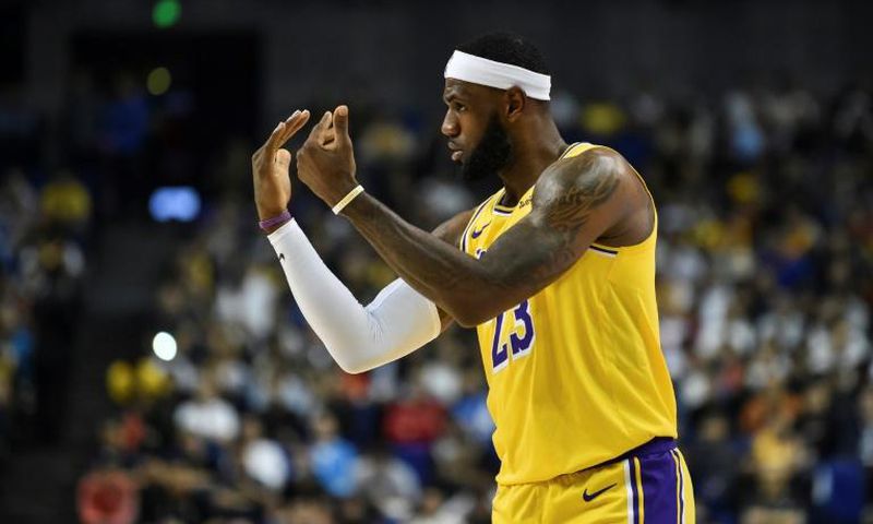 Los Angeles Lakers superstar LeBron James gestures while playing against the Brooklyn Nets on October 10, 2019 at the Mercedes-Benz Arena in Shanghai, China