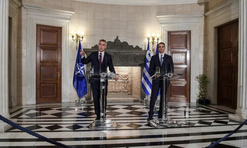 NATO's General Secretary Jens Stoltenberg (L) speaks next to Greek Prime Minister Kyriakos Mitsotakis during a press conference after their meeting in Athens on October 10, 2019