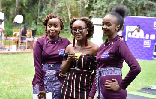 Ladies pose for a photo at the Dark and lovely 'own your crown' event
