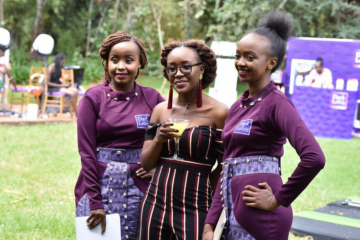 Ladies pose for a photo at the Dark and lovely 'own your crown' event