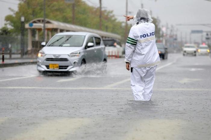 Heavy rains have pounded Japan, prompting flood and landslide warnings