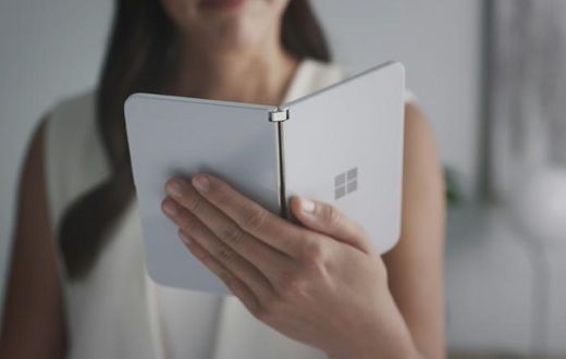 Microsoft will get back into the smartphone market with a new kind of folding device call Surface Duo, which will be launched next year and will be compatible with Android apps from tech rival Google's mobile operating system