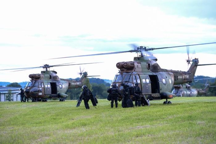 French elite police officers arrived by helicopters at the high-security prison in Conde-sur-Sarthe