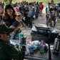 A US Border Patrol agent interviews immigrants after taking them into custody on July 02, 2019 in Los Ebanos, Texas