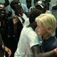 Frawley embraces Omar as they are reunited 15 years later on a migrant rescue ship