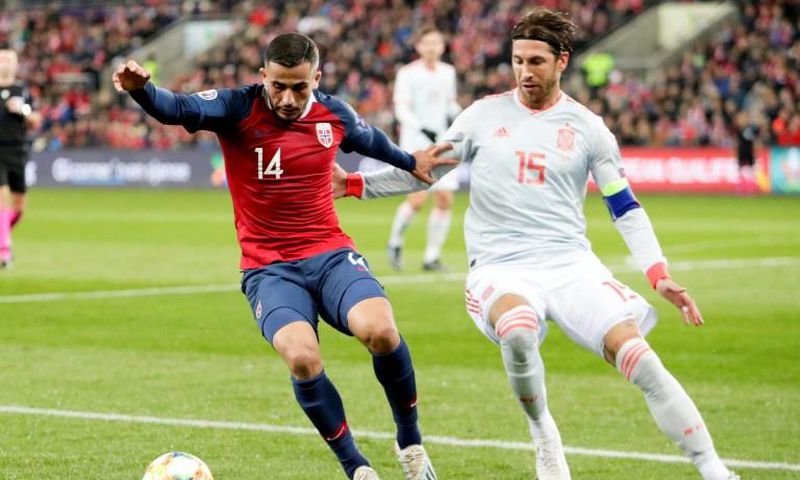 Sergio Ramos (right) takes on Norway defender Omar Elabdellaoui