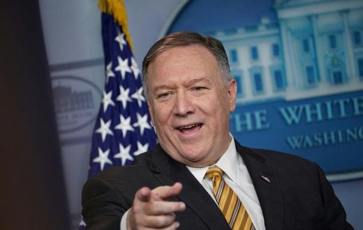 US Secretary of State Mike Pompeo smiles as he takes questions at the White House following the surprise departure of John Bolton as national security advisor