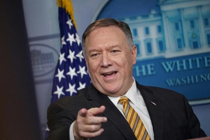 US Secretary of State Mike Pompeo smiles as he takes questions at the White House following the surprise departure of John Bolton as national security advisor